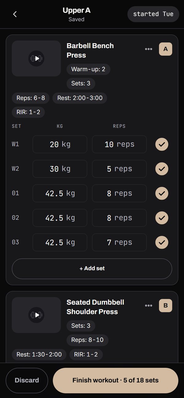 The workout logger on a phone part way through a session, with completed sets ticked and the weight and reps for each set